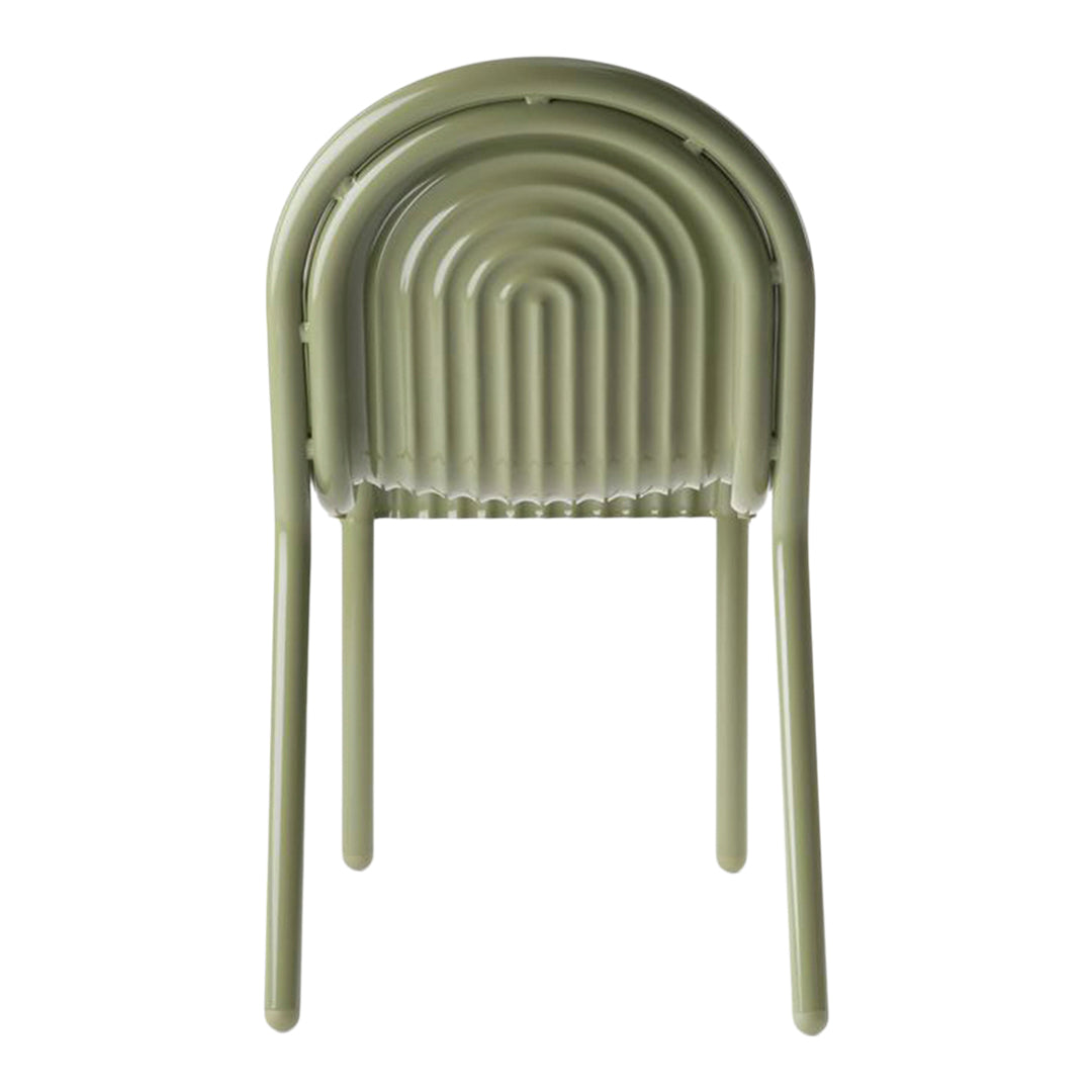 Green ribbed stacking chair with a smooth finish and curved design, perfect for modern decor.