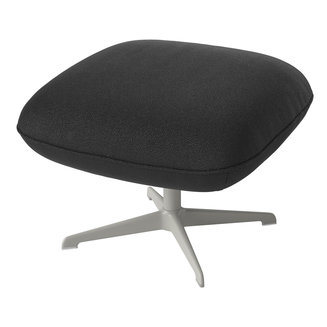 Black textured cushion with a smooth light gray base, minimalist design, suitable for modern decor.