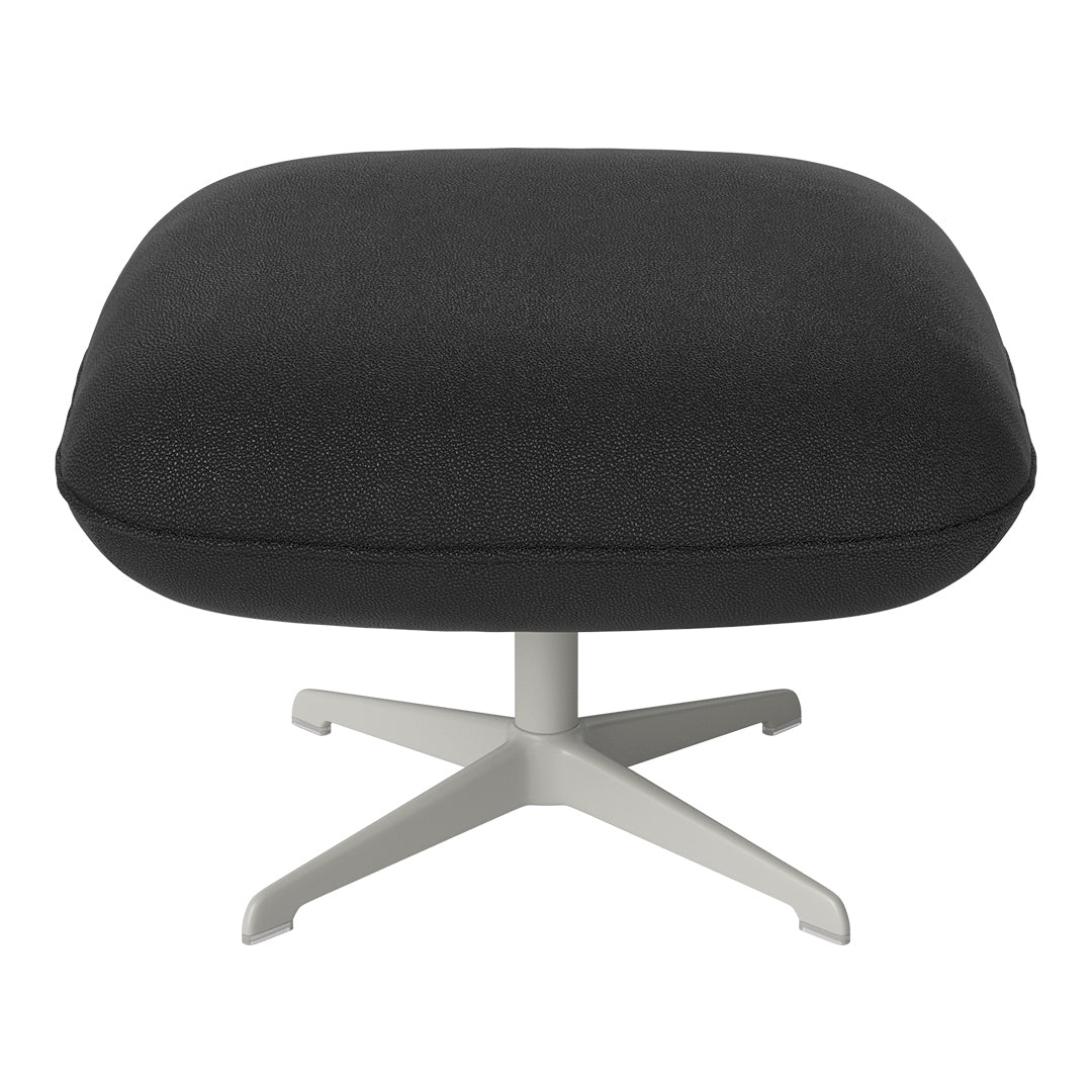 Black textured cushion on a sleek white metal base, offering modern aesthetic and comfort.