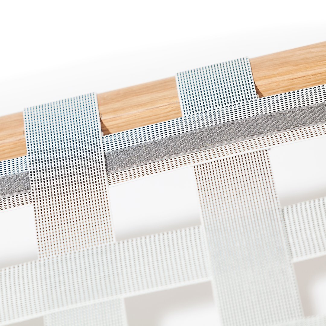 Light blue and gray woven patterns with wooden accents, showcasing a modern, textured design.