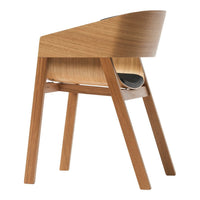 Wooden chair with a smooth light wood finish, featuring elegant curves and minimalist design. Ideal for modern decor.