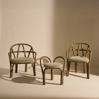 Set of three modern chairs in muted olive green with a soft textile pattern on seats against a neutral backdrop.
