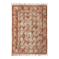 Textured area rug featuring earthy tones of beige, rust, and green with a geometric diamond pattern and fringed edges.