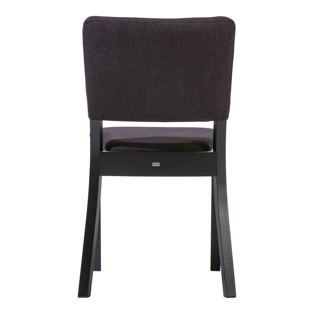 Back view of a dark gray upholstered chair with a sleek black wooden frame. Modern design with subtle texture.