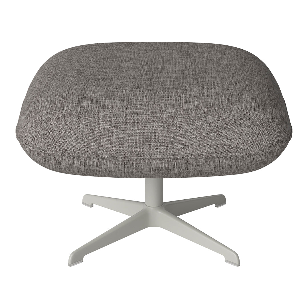 Gray textured fabric ottoman with a round, soft cushion and a sleek white base. Ideal for modern decor.