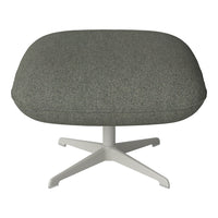 Gray upholstered ottoman with a textured finish and a light-colored, sturdy base.