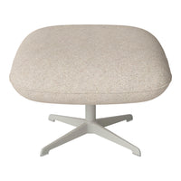 Beige upholstered ottoman with a soft, textured finish and a light gray metal base, minimalist design.