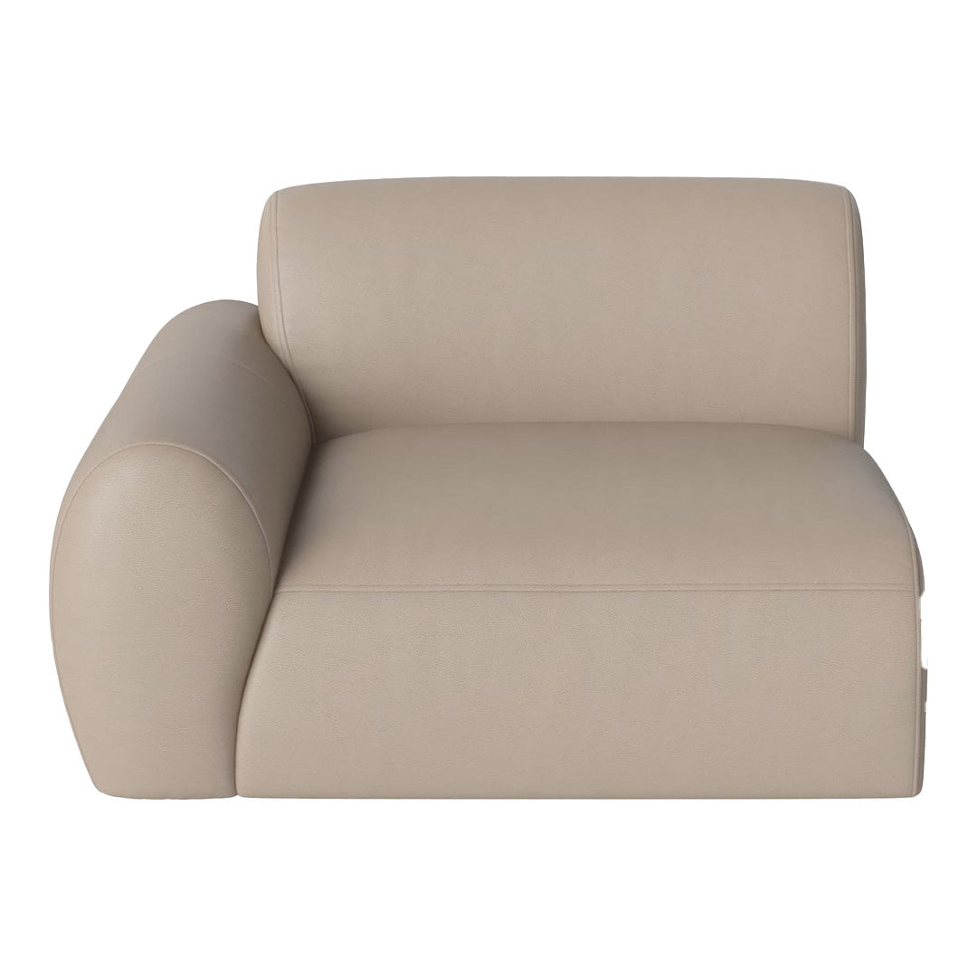 Beige modern armchair with smooth, soft leather texture and rounded armrests. Stylish and contemporary design.