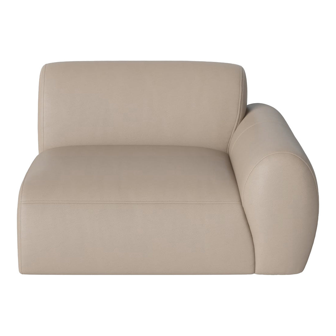 Beige upholstered chair with a smooth, contemporary design; minimalistic and stylish for modern interiors.