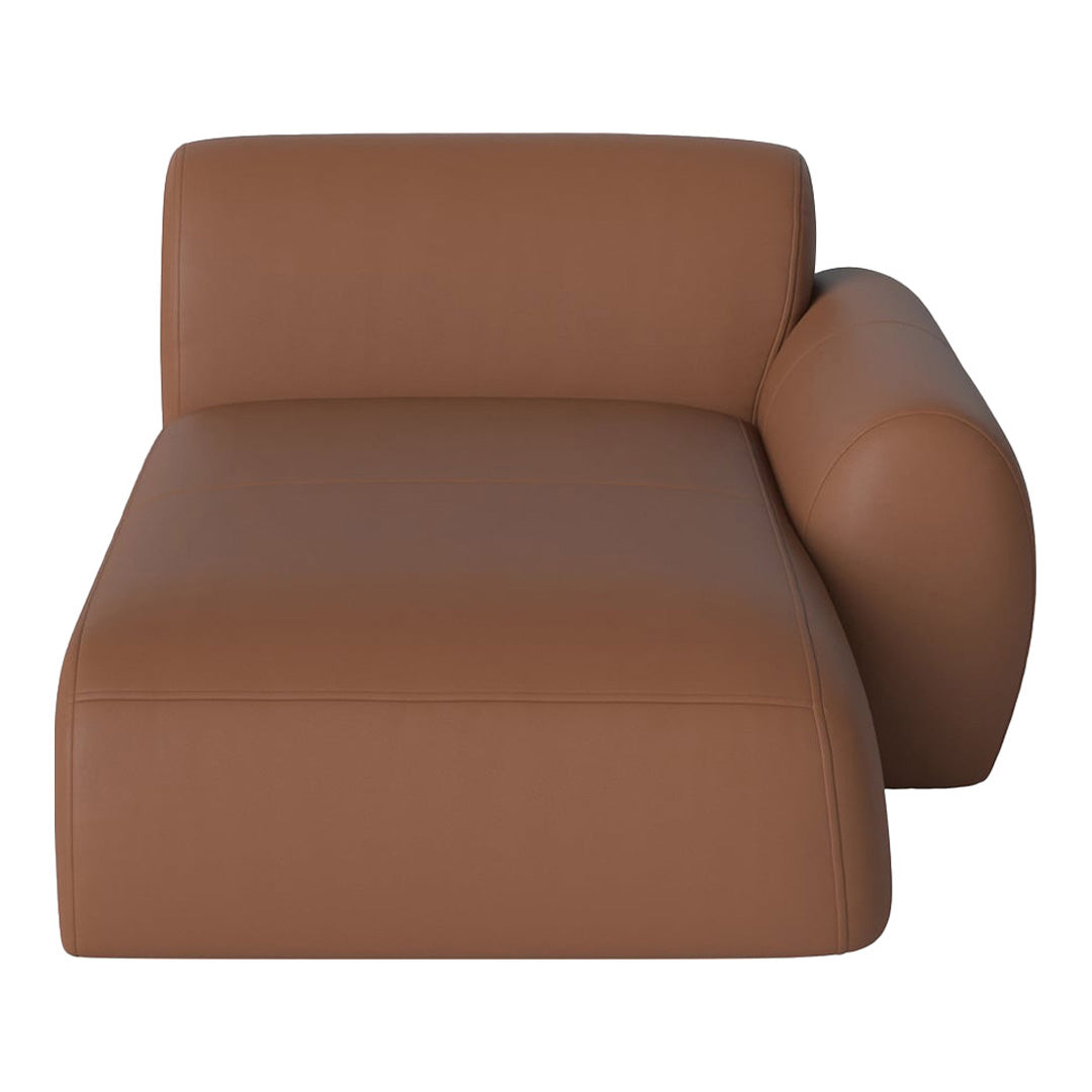 Brown leather chaise lounge with smooth texture and minimalistic design, perfect for modern decor.