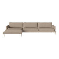 Beige sectional sofa with a smooth fabric surface and minimalist design, featuring a simple, uniform pattern.