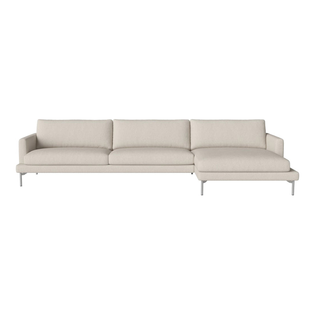 Beige sectional sofa with smooth fabric and minimalist design, featuring a neutral color palette and subtle texture.
