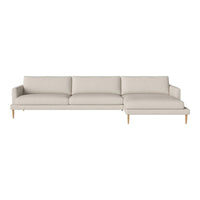 Modern beige sofa with a clean-lined design and light wooden legs, featuring a smooth, solid fabric upholstery.