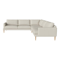 Beige sectional sofa with clean lines and subtle texture, featuring light wooden legs for a modern touch.