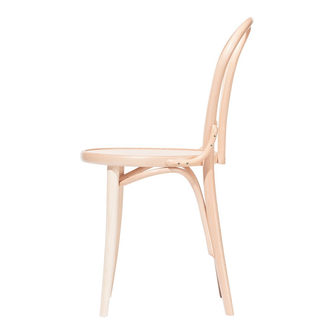 Light natural wood chair with smooth, curved lines and a minimalist design.