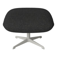 Black textured upholstery with a smooth, modern white base. Contemporary design for versatile decor styles.