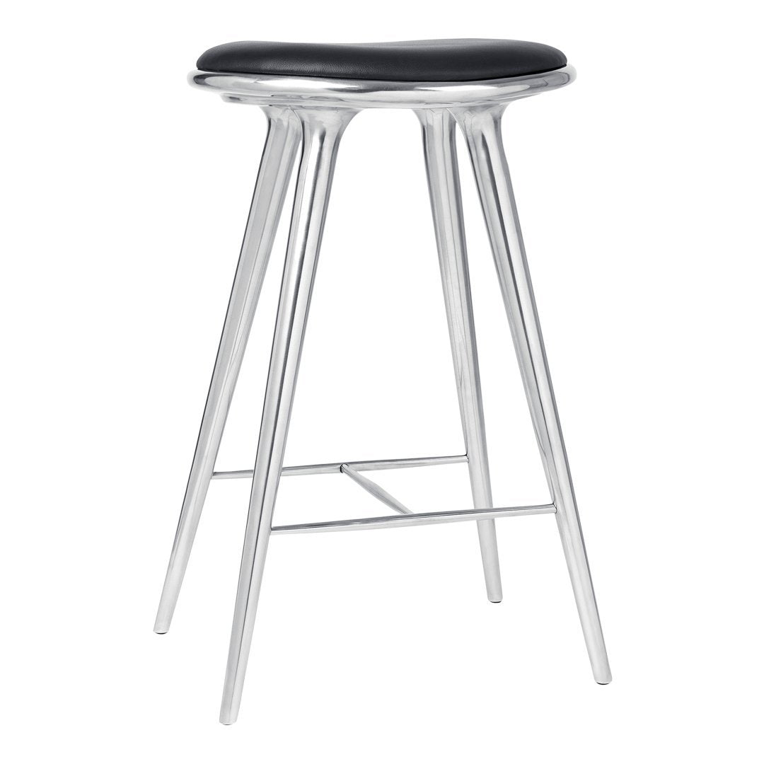 Black upholstered seat with sleek silver legs, minimalistic design perfect for modern interiors.