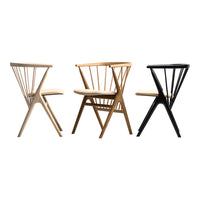 Three chairs: natural wood, light beige, and black. Unique slatted backs and X-shaped legs create a modern look.