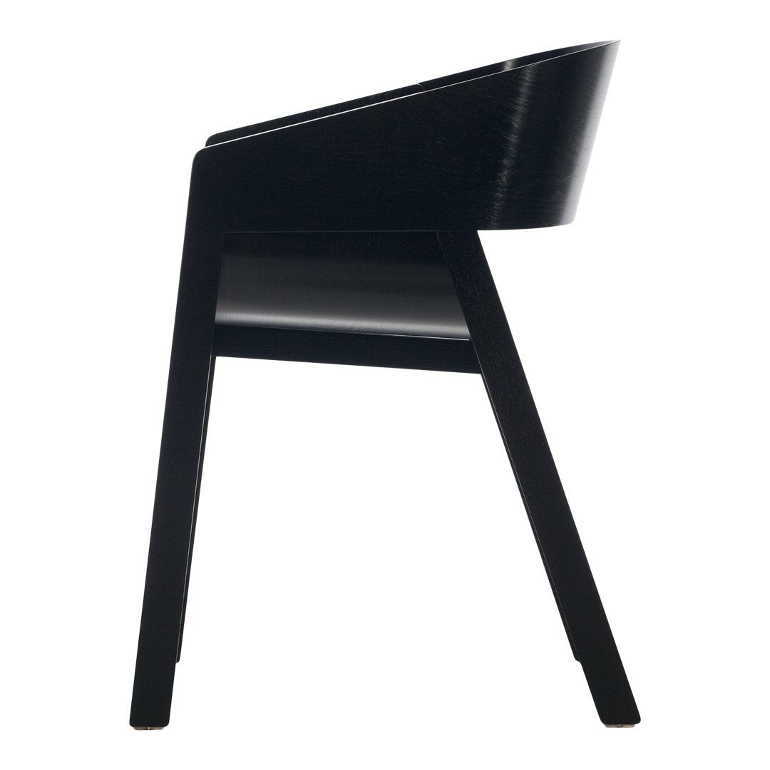 Sleek black chair with a minimalist design and smooth surface, perfect for modern decor.