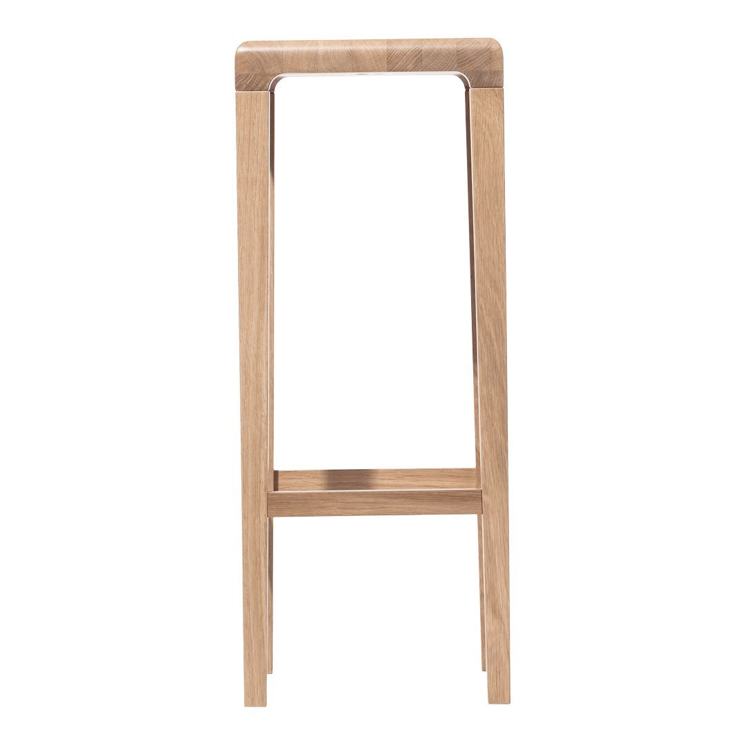 Light wood bar stool with a minimalist design, showcasing natural oak tones and smooth, clean lines.