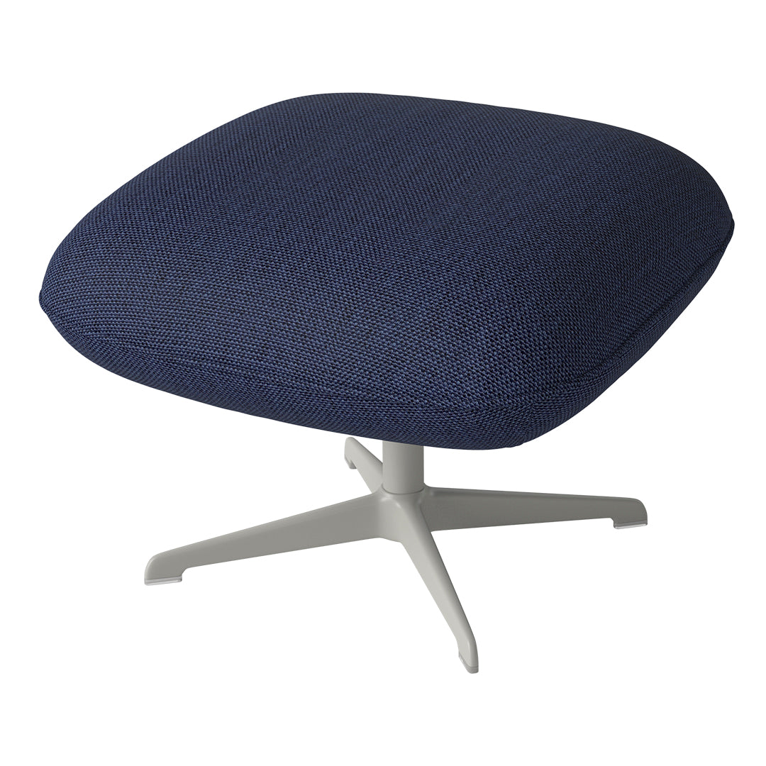 Navy blue textured fabric cushion on a sleek white base, perfect for modern decor.