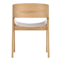 Light oak wooden chair with a smooth white seat, minimalistic design and curved backrest. Perfect for modern interiors.