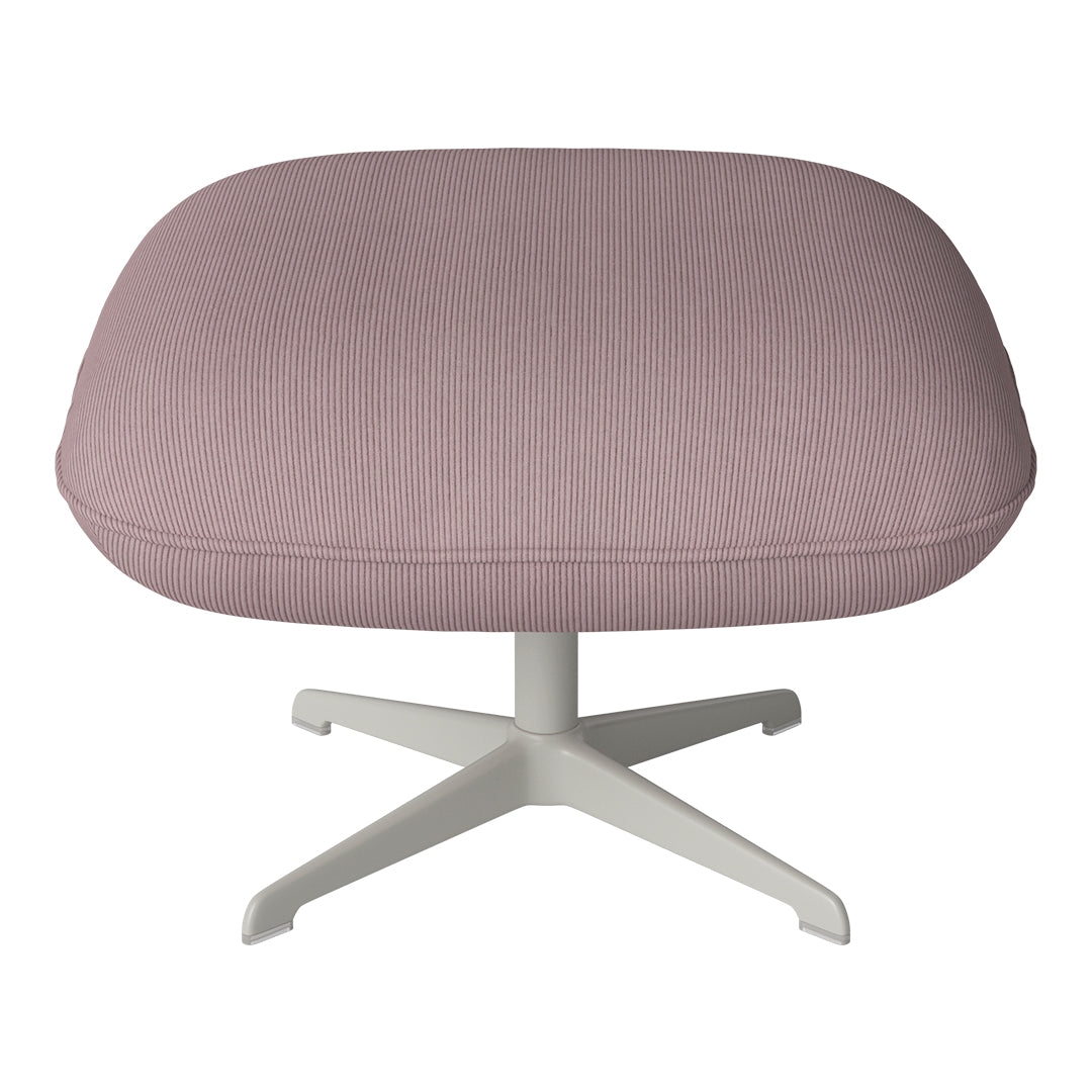 Light pink ribbed upholstery on a modern chair with a sleek white base, perfect for contemporary decor.