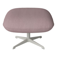Light pink ribbed upholstery on a modern chair with a sleek white base, perfect for contemporary decor.