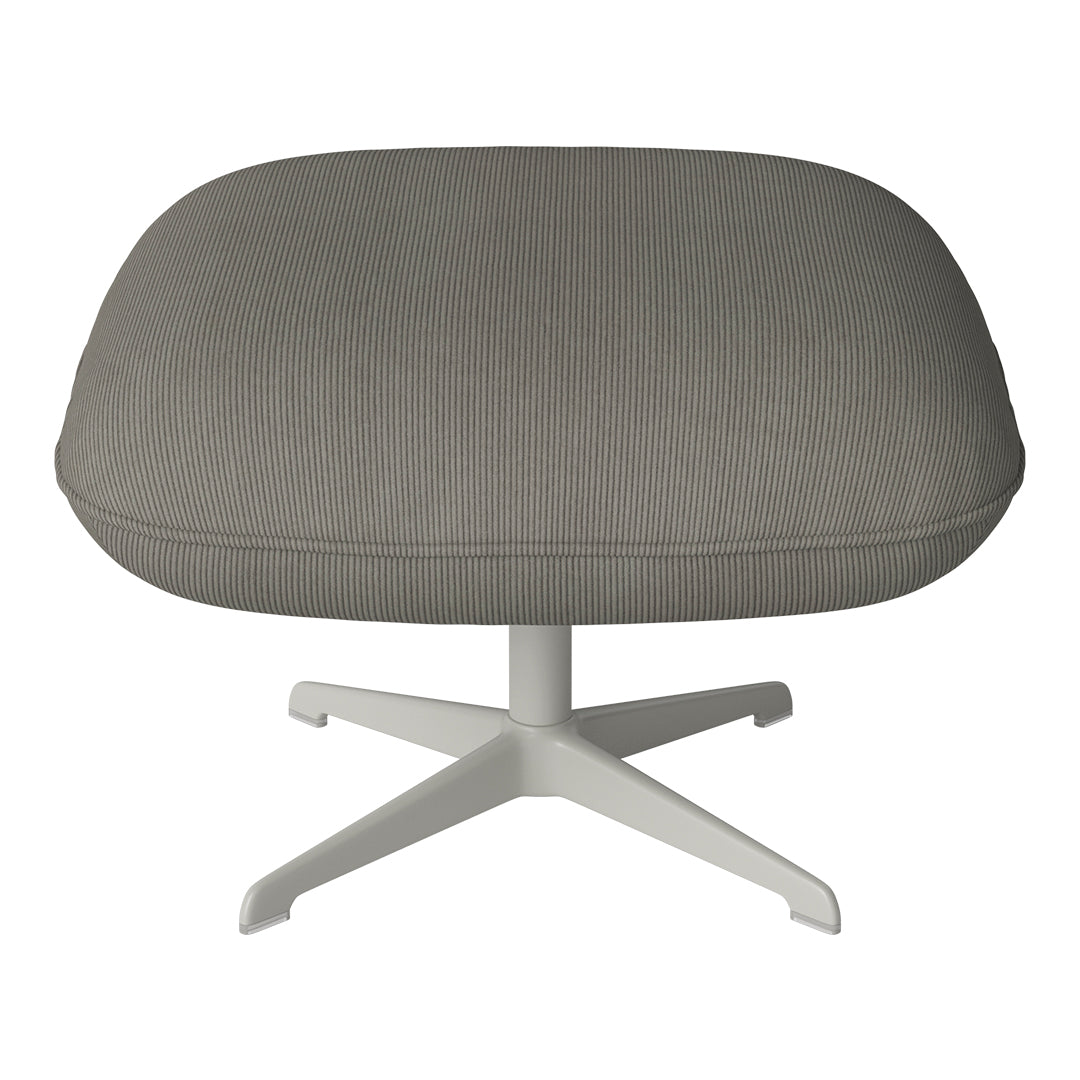 Gray ribbed upholstery on a modern chair with a sleek white base, offering a stylish, contemporary look.
