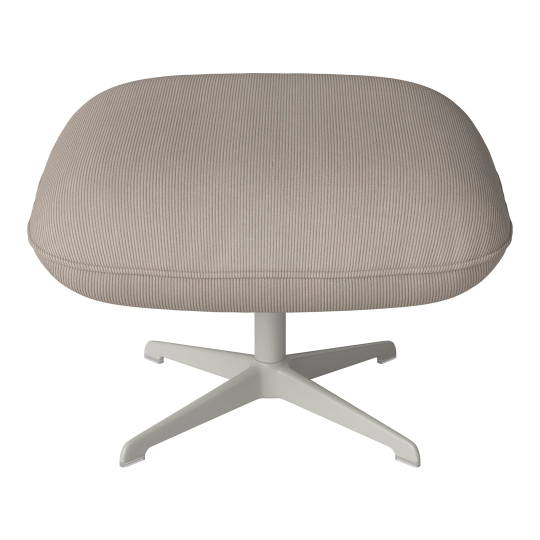 Light beige ribbed upholstery on a round ottoman with a sleek white star base. Ideal for modern interiors.