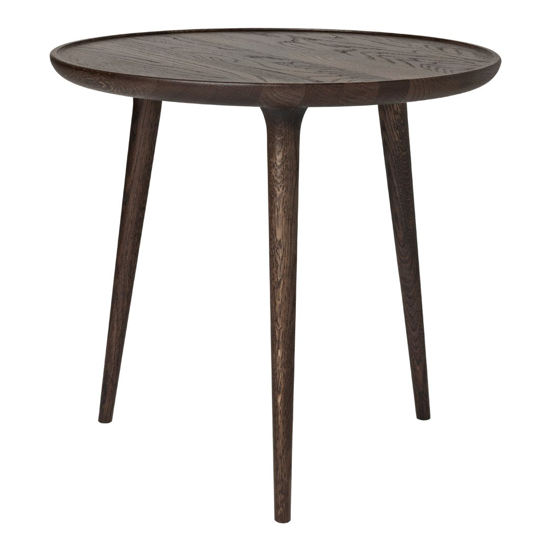 Round wooden side table in dark brown finish with natural wood grain patterns and tapered legs. Ideal for modern decor.