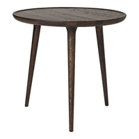 Round wooden side table in dark brown finish with natural wood grain patterns and tapered legs. Ideal for modern decor.