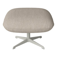 Beige upholstered ottoman with subtle linear pattern, featuring a modern light gray base.
