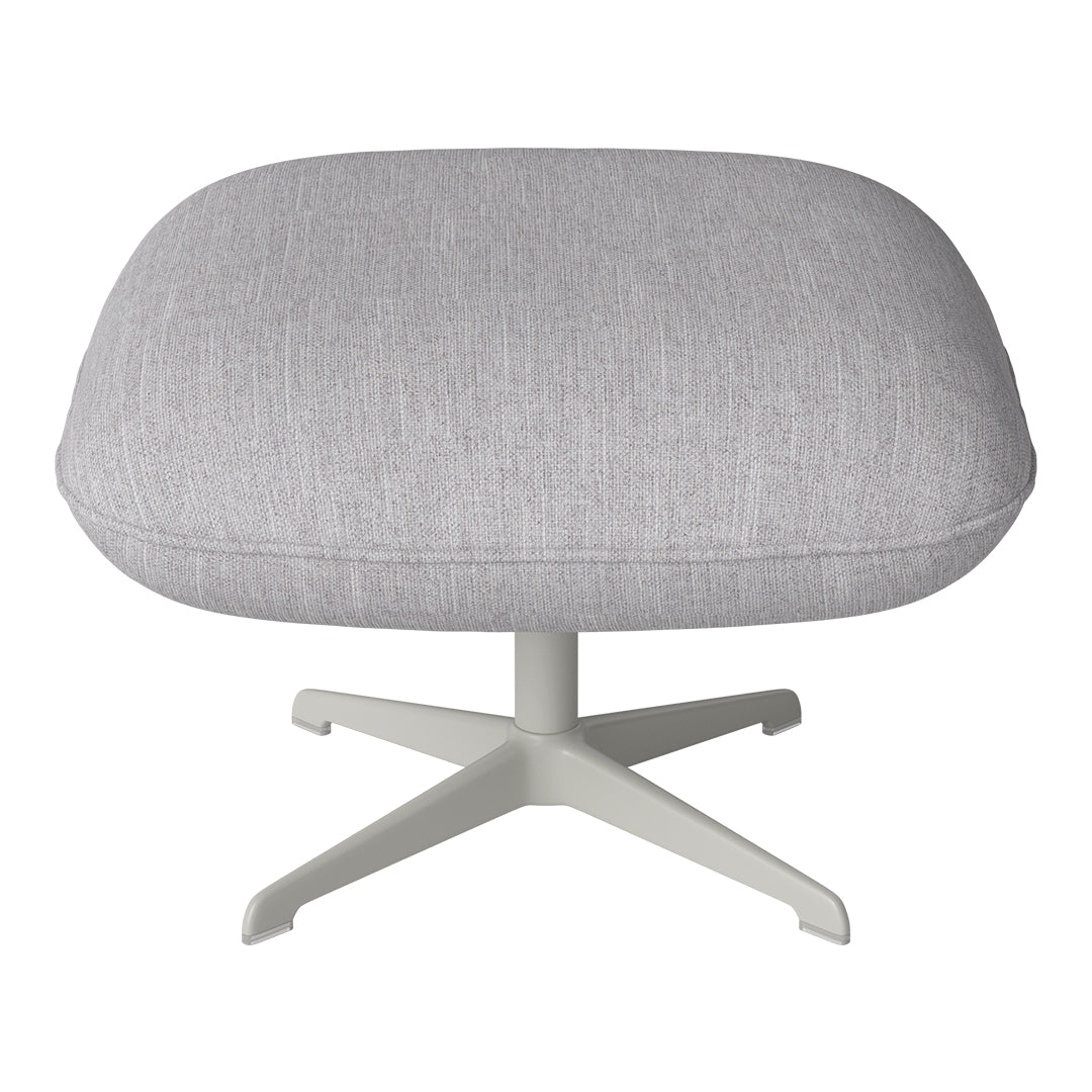 Light gray textured upholstery on a modern ottoman with a minimalist white base. Ideal for contemporary decor.