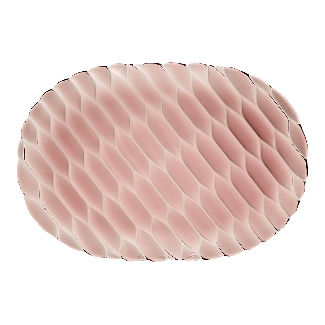 Pink oval mat featuring a textured honeycomb pattern for a stylish touch in home decor.