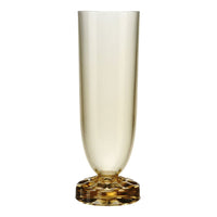 Clear champagne flute with a light amber body and a patterned amber base, perfect for elegant dining.