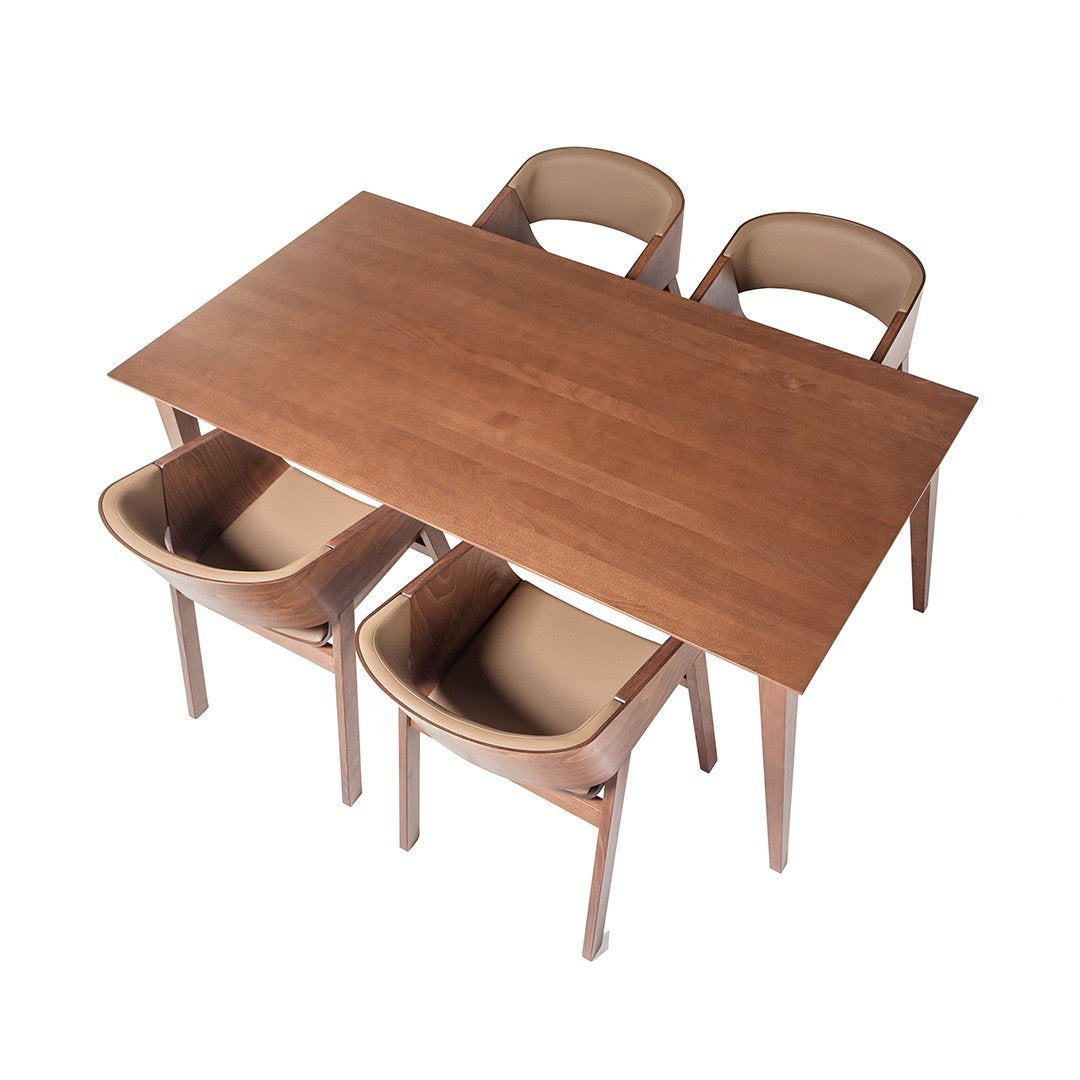 Wooden dining table with a rich brown finish, paired with cream-colored upholstered chairs for a modern look.