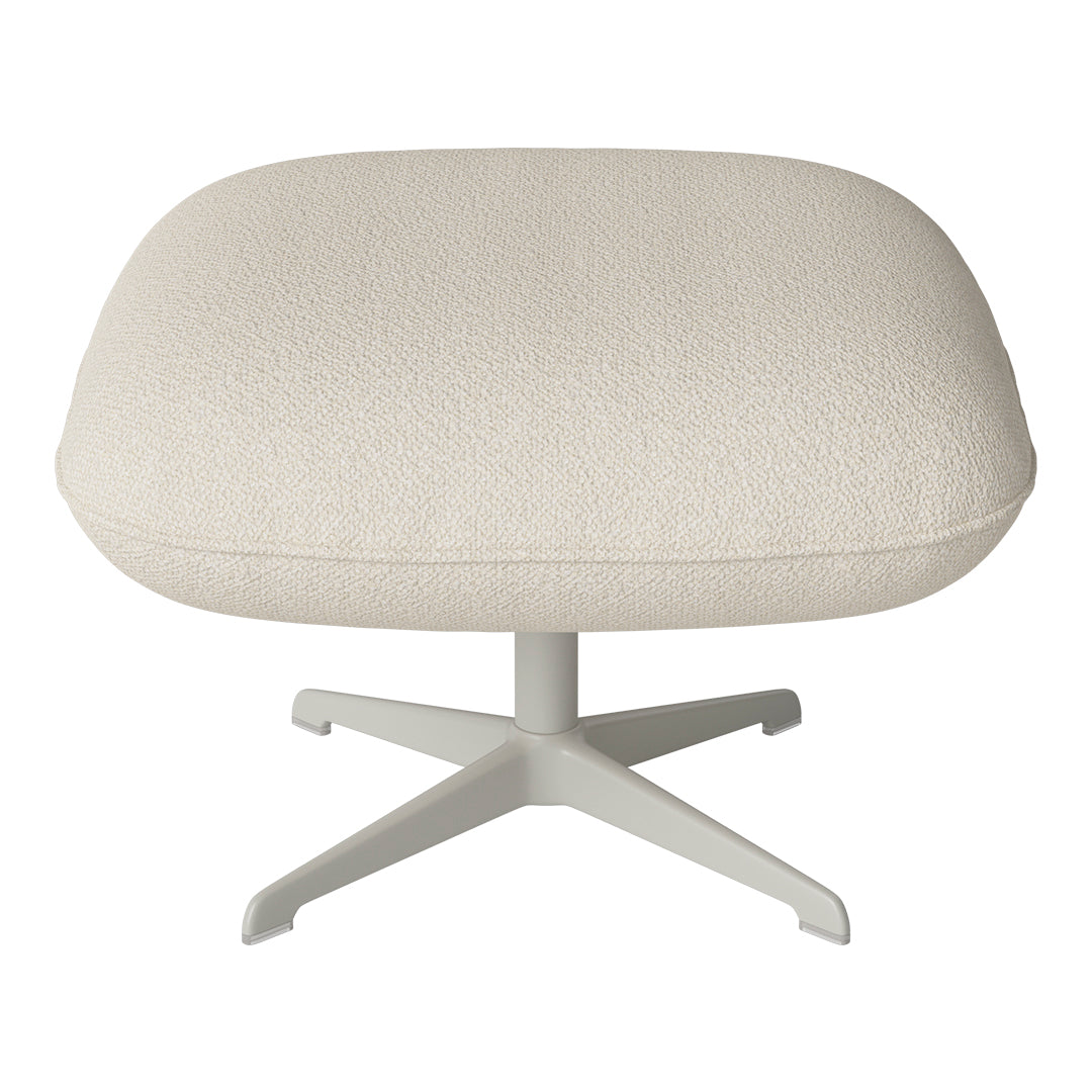 Cream-colored cushioned ottoman with a textured, speckled pattern on a light gray base.