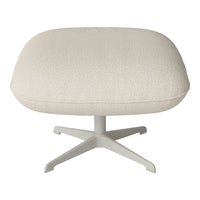 Cream-colored cushioned ottoman with a textured, speckled pattern on a light gray base.