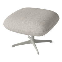 Soft beige upholstery with a subtle textured pattern, complemented by a sleek white base.