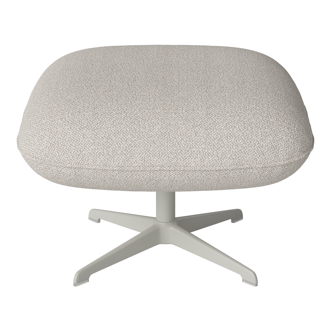 Light beige upholstered ottoman with a textured pattern and a sleek white metal base.