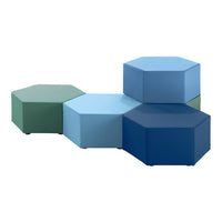 Hexagonal ottomans in shades of green, light blue, and dark blue with a glossy finish and modern design.