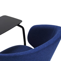Fitted in deep navy blue fabric with a sleek black table design, perfect for modern decor.