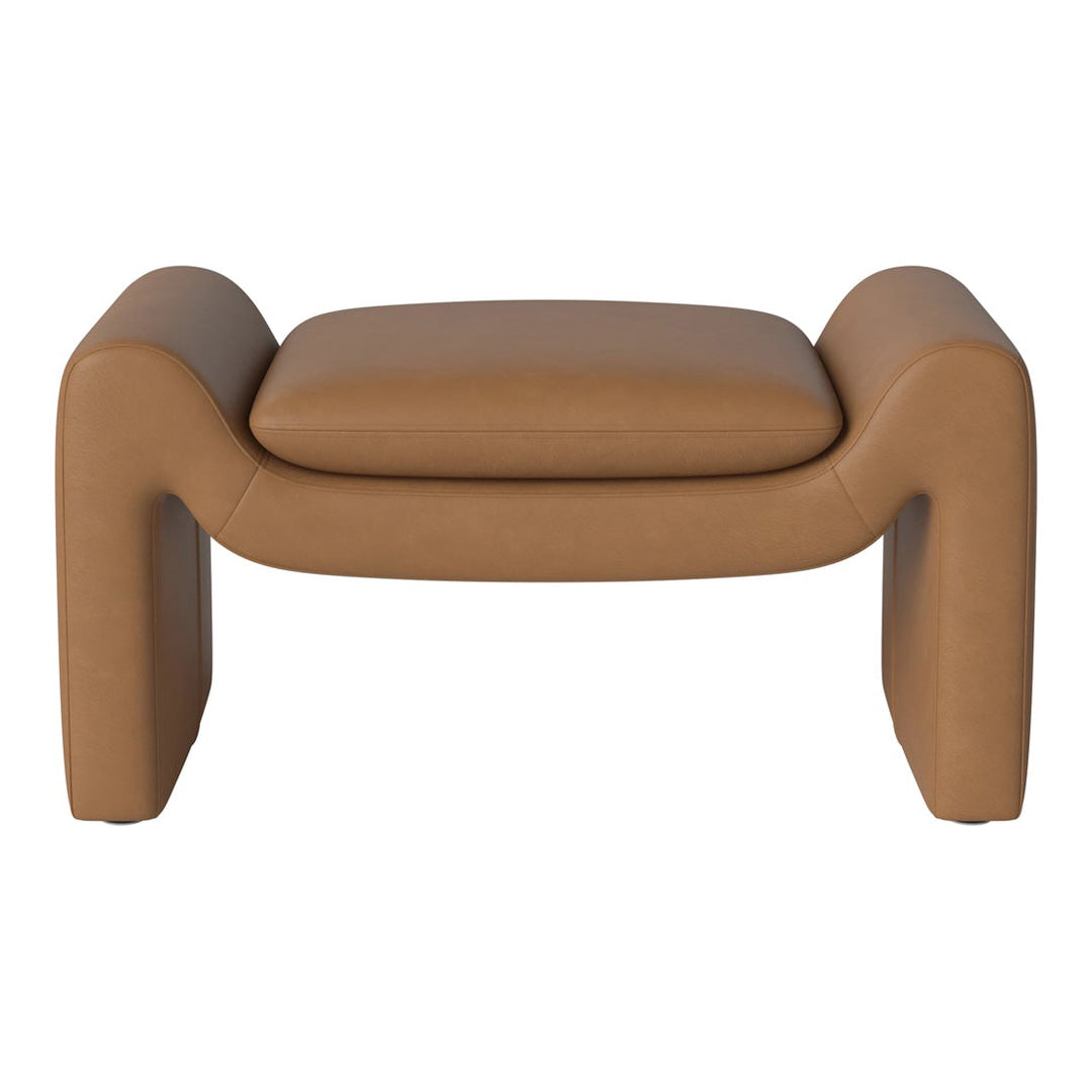Tan leather ottoman with smooth, rounded edges and a minimalistic design, perfect for modern decor.