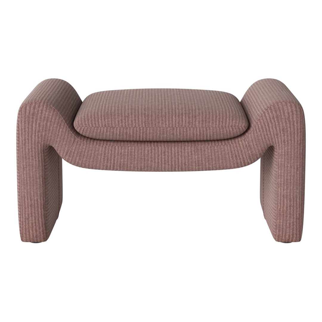 Pink striped ottoman with soft, textured fabric and a modern, curved design. Perfect for any decor style.