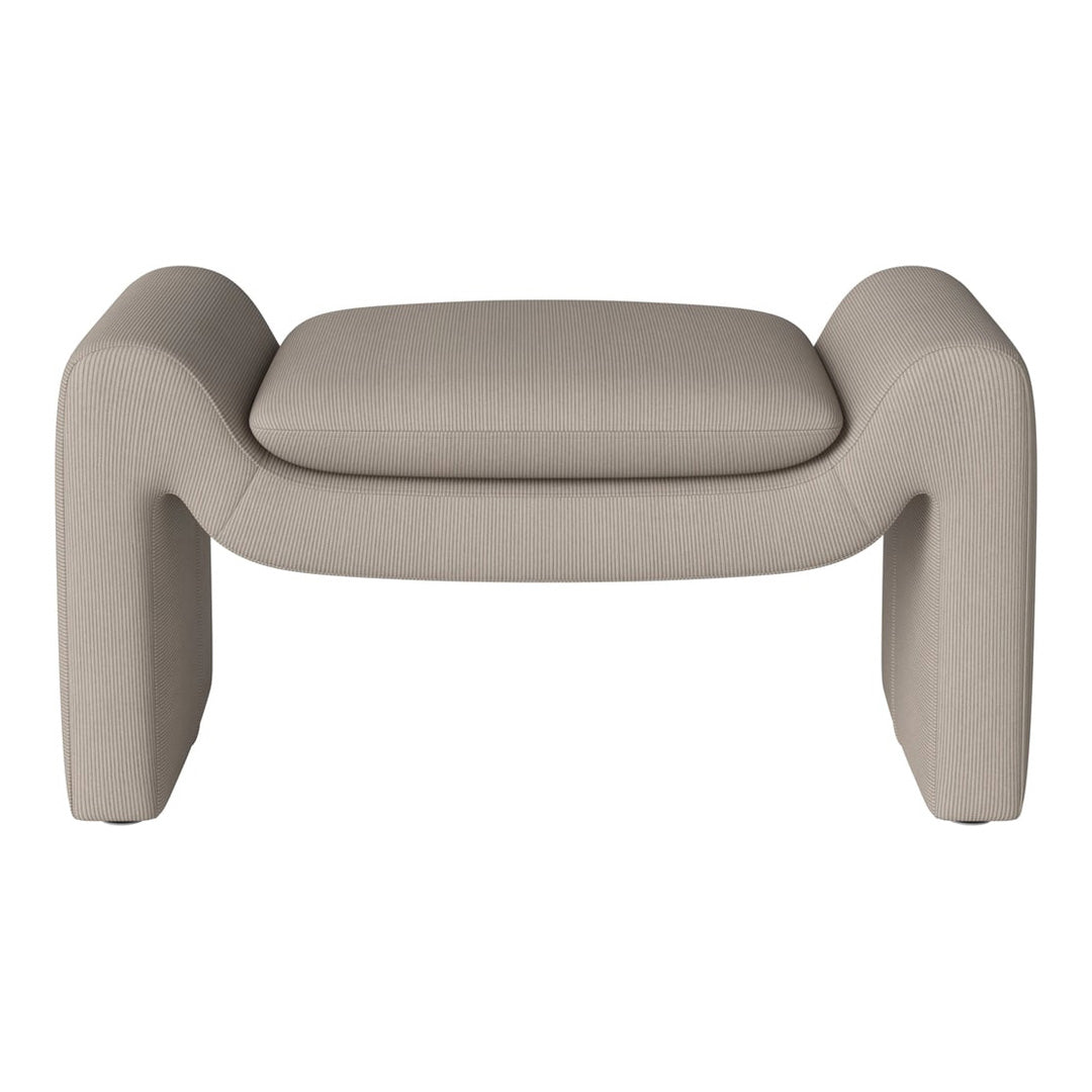 Beige striped ottoman with rounded edges and a plush cushion, perfect for modern decor.