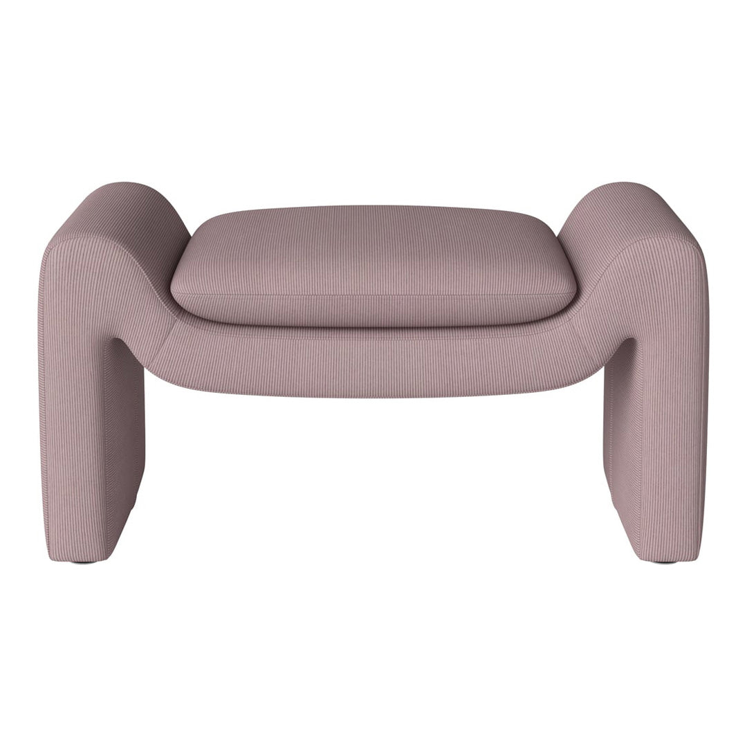 Soft pink bench with subtle ribbed texture and rounded edges, perfect for modern decor.