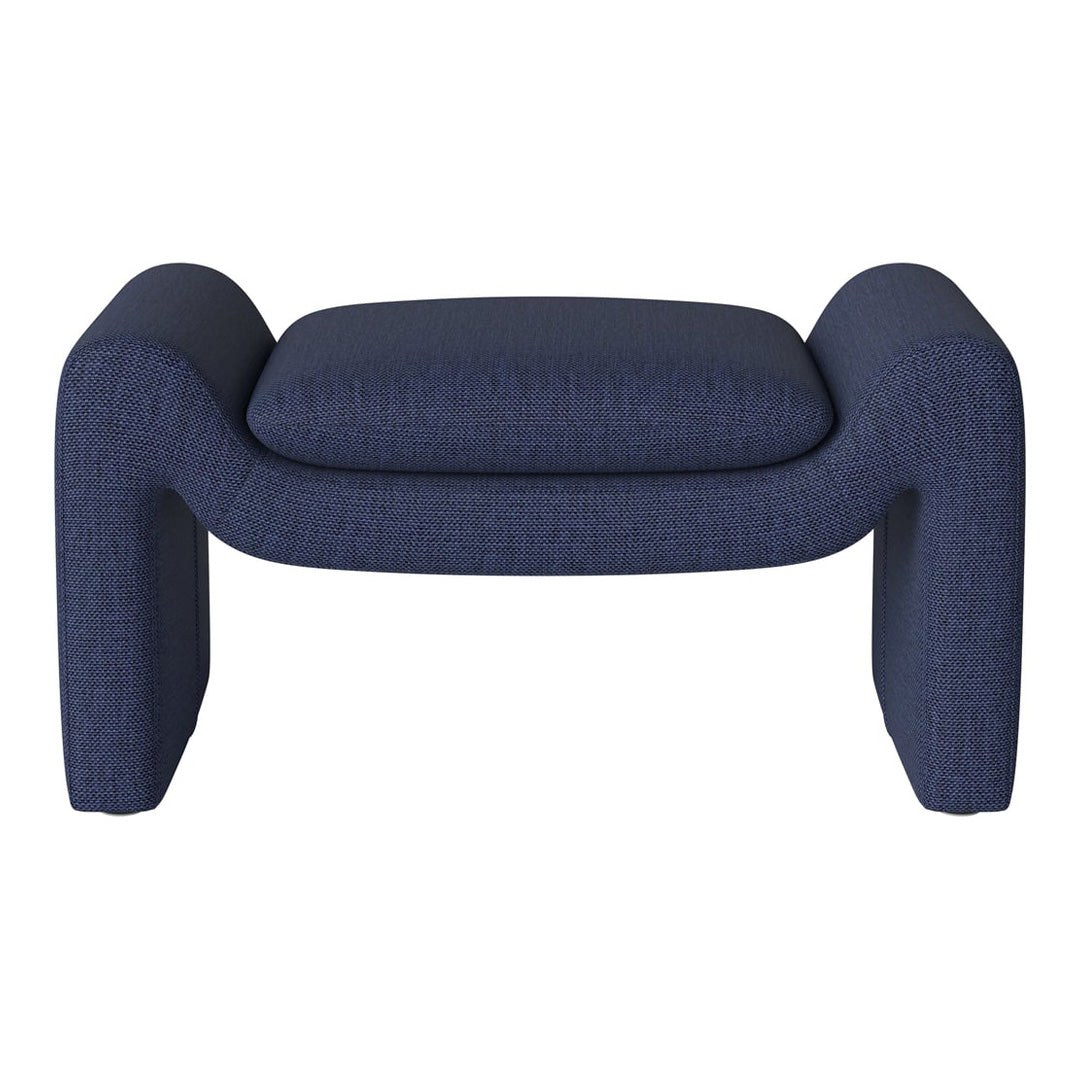 Blue upholstered ottoman with a textured pattern and curved edges, ideal for modern interiors.