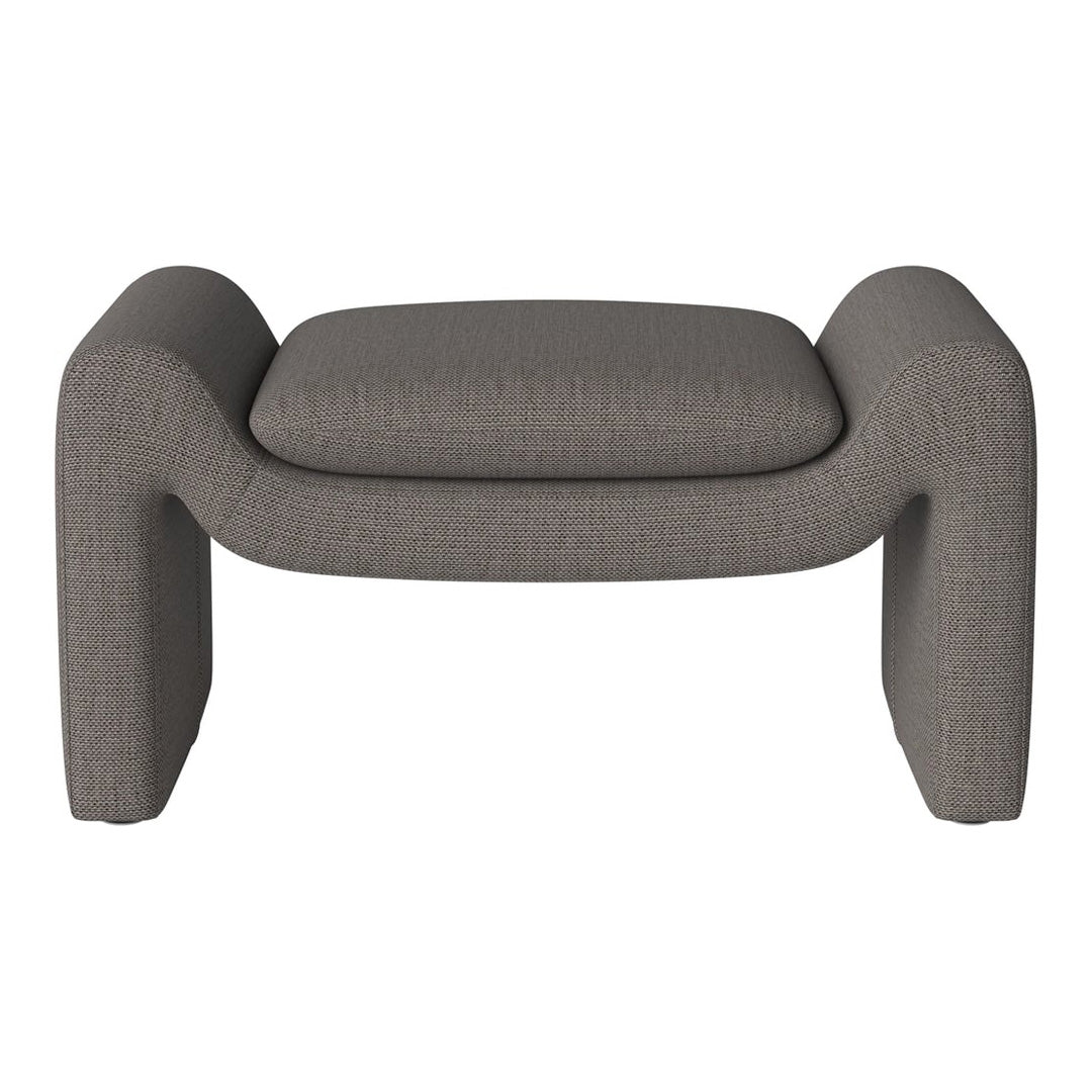 Gray upholstered ottoman with a soft woven texture and curved design, perfect for modern living spaces.