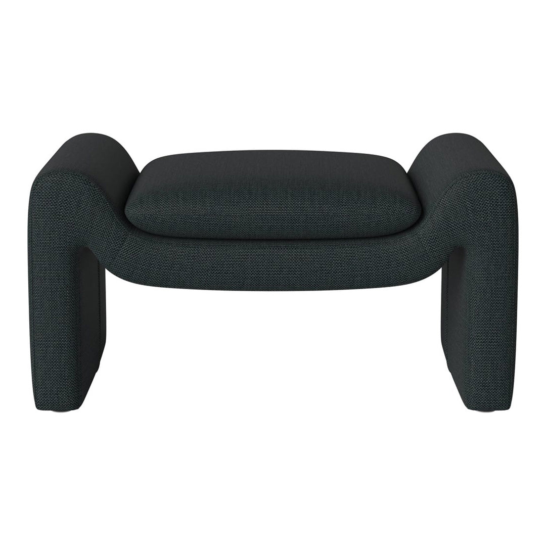 Dark green textured fabric ottoman with a modern, curved shape and minimalistic design.